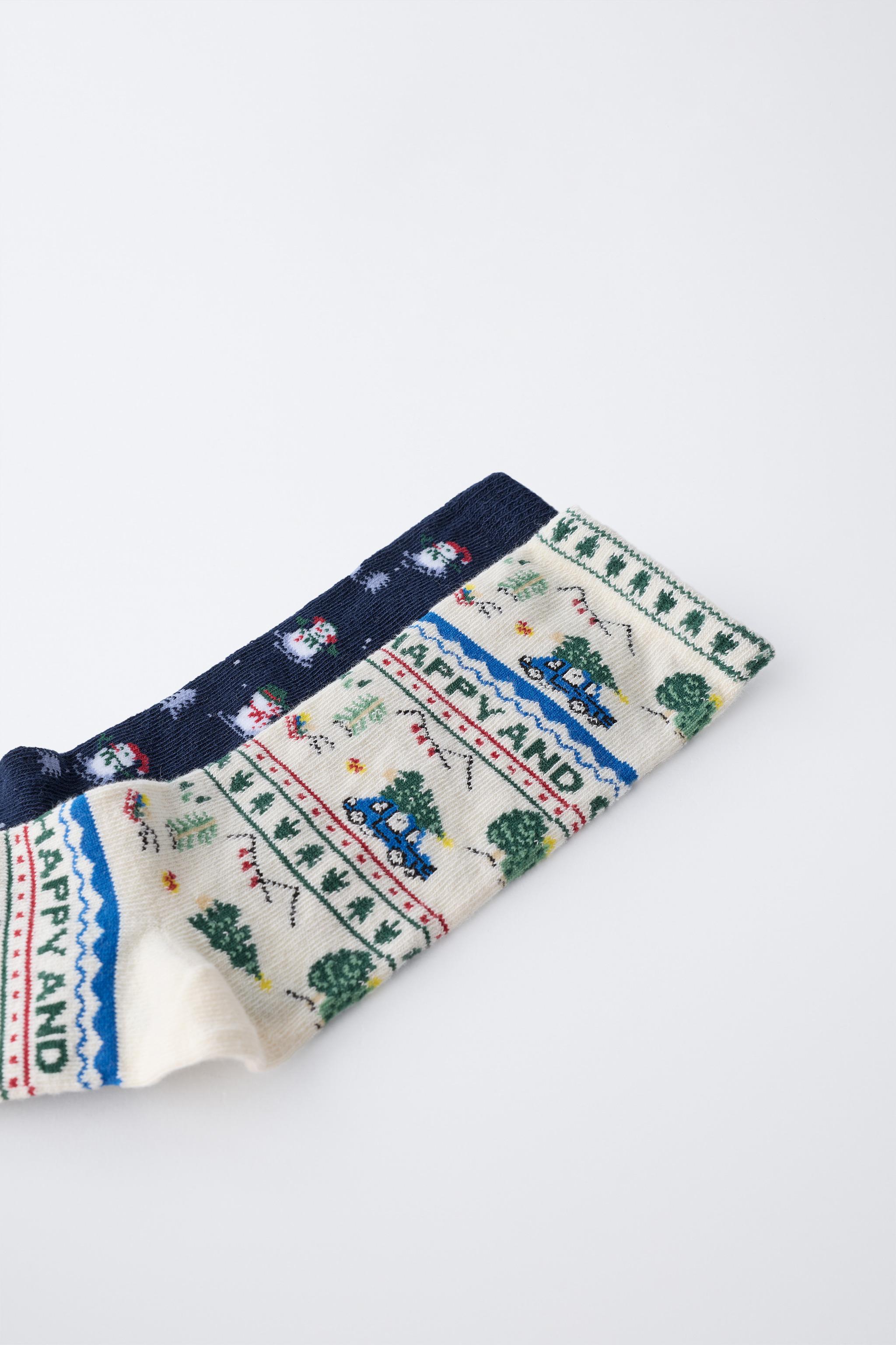 LOT DE DEUX PAIRES CHAUSSETTES AVEC ARBRES ET BONHOMME NEIGE